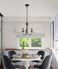 Dining area with Three Light Black Steel Chandelier For Home Decor With Classic Estate Style Vibe Vintage Inspired Ceiling Fixture.