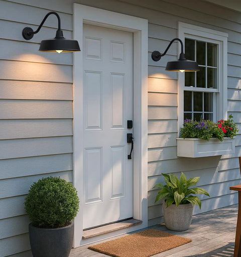 Gooseneck Barn Light With 15 Inch Arm Dusk To Dawn Outdoor Porch Fixture illuminating a house entryway with vintage style.