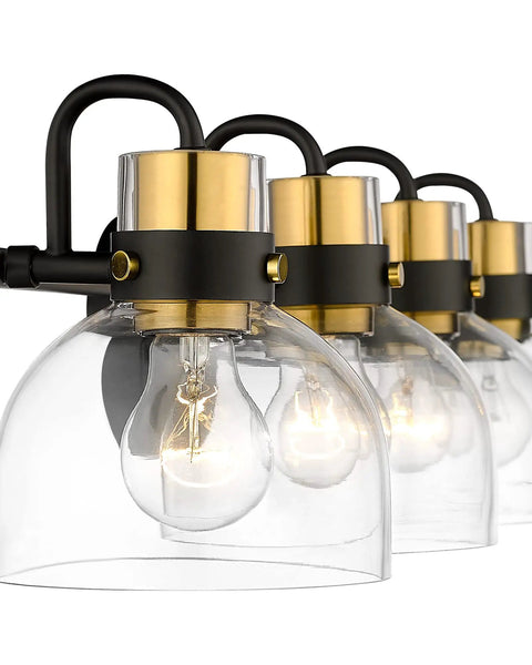 Close-up of Four Light Bathroom Vanity Wall Sconce Over Mirror With Clear Glass Shades Black Backplate And Brushed Gold Finish