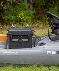 TracPak Quick Release Mounting Base for Track Mount Storage Boxes with two rods in a kayak setup, showing modular gear organization.