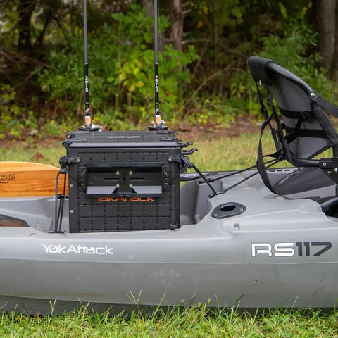 TracPak Quick Release Mounting Base for Track Mount Storage Boxes with two rods in a kayak setup, showing modular gear organization.