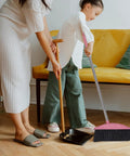 Long Handle Broom With Dense Stiff Bristles Heavy Duty Floor Sweeper Built For Yards Driveways Garages Low Bend Build in use by parent and child.