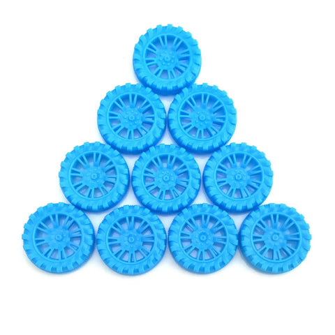 Blue wheels from 300 Pcs Toy Wheels And 150 Pcs STEM Shafts For DIY RC Cars Boats And Helis Build Your Own Model Projects