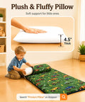 Child rolling Detachable Toddler Nap Mat With Pillow And Blanket Thickened Extra Large Sleeping Bag, green truck print, in room.