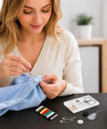 Woman using 25 Pack Mini Sewing Kits Bulk On The Go Quick Fix Solid Wardrobe Essentials to sew a button on a shirt.