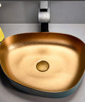 Heavy Duty Rectangular Vessel Sink Installed Above Counter From Porcelain Ceramic With A Sleek Closed Glaze That Handles Scratches And Stains Like A Champ And Keeps Your Lavatory Spick And Span With Zero Hassle When Upgrading Your Vanity Setup Today, gold and blue ceramic basin with round drain.
