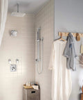 Voss 6 Inch Rain Shower Head With Immersion Technology, Single Function, 2.5 GPM Flow, Chrome Finish in a modern bathroom setting.