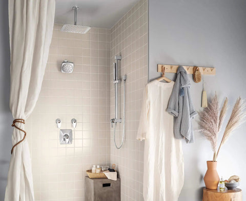 Voss 6 Inch Rain Shower Head With Immersion Technology, Single Function, 2.5 GPM Flow, Chrome Finish in a modern bathroom setting.