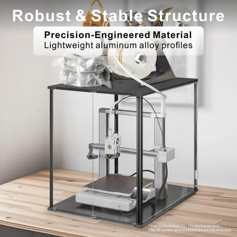 3D Printer Enclosure For Bambu Lab A1 With Fume And Odor Control, featuring black frame and clear panels on a wooden table.