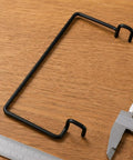 Heavy Duty Stainless Steel Mounting Bracket For Igt Side Table With Dual Slide Hooks Built Tough For Outdoor Cooking Gear, on wood.