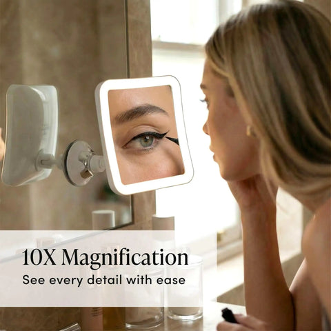 10X Magnifying Lighted Makeup Mirror With Natural Daylight LEDs Portable Cordless Vanity Mirror in use for precision eye makeup
