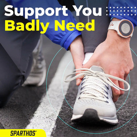 Runner adjusting shoelace while wearing a lace up ankle brace with adjustable support for running and court sports, large gray