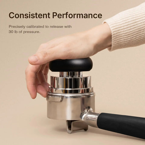 Ultimate Espresso Tamper Set For 58.4Mm Portafilters with user applying 30lb pressure on stainless steel tamper.