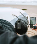 Person using phone with Global Satellite Messenger With Two Way SMS, GPS Tracking, Off Grid Communication, SOS Emergency Beacon