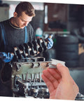 Mechanic working on engine crankshaft with hand holding a piece of 12-Piece Galvanized Steel Toggle Wing Bolts Kit For Drywall Anchors