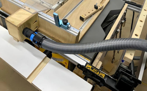 Mitansle Ribbed TPE Dust Collection Hose Adapter Kit Includes One Foot Smooth Bore Hose For Shop Vac Systems connected to woodworking equipment.