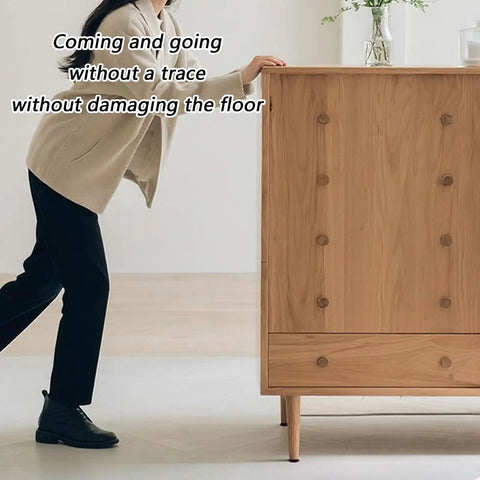 A person using Heavy Duty 24Pcs Furniture Sliders Moving Tools With Foam Pads for smooth gliding on a wooden cabinet.