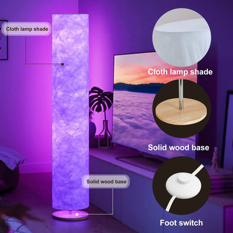 Lit 52 Inch Slim Modern Floor Lamp With RGB Color Changing Tyvek Fabric Shade, solid wood base, and foot switch in a room setting.