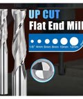 Carbide end mills, two pieces, with spiral flutes and 1/8 inch shanks, front view.