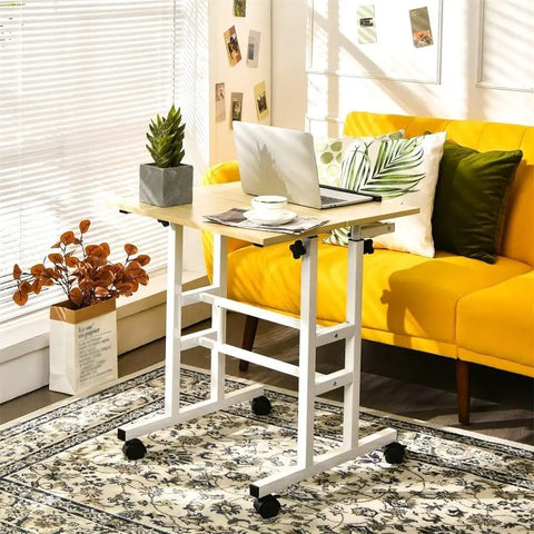 Adjustable Height Steel And Wood Mobile Standing Desk With Smooth Gliding Wheels Serves As Premium Laptop Table And Breakfast Tray Top Shelf Build That Hits Different For Remote Work Vibes Moves Like Butter in cozy living room setting.