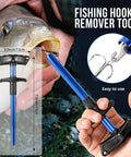Fishing hook remover tool in hand next to a fish mouth, blue and black handle, 7.7cm x 17cm dimensions shown, easy to use.
