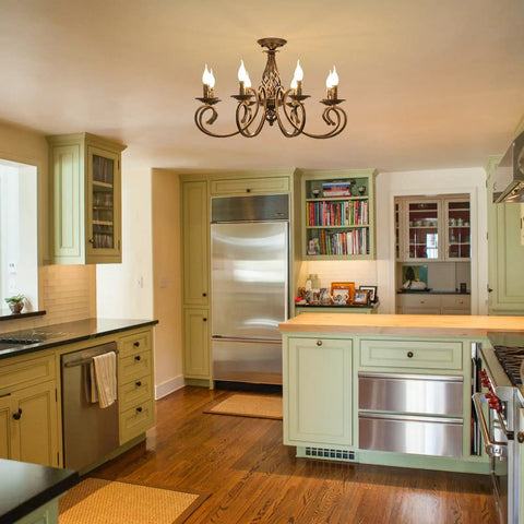 Rustic 8 Light Candle Chandelier In Vintage Iron With French Country Charm Farmhouse Pendant Light in kitchen setting.