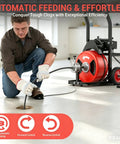 Man using Heavy Hit 100 Ft Auto Feed Drain Cleaner with three quarter inch cable to unclog floor drain effortlessly.
