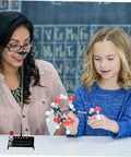 Teacher and student with Physics Mechanics Teaching Kit With Pendulum Set And Ball Lab Gear For Classroom Experiments Hands On Science Tools