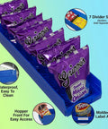 Heavy Duty Plastic Shelf Bins For Garage And Closet Organization 24 Inch By Six And A Half Inch By Four Inch Blue Six Pack Durable Storage Bins For Shelves Cabinets And Drawers filled with snack bags, showing divider slots and hopper front.