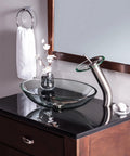 Oval Clear Glass Vessel Sink For Above Counter Mount Dope Sleek Look with faucet on modern bathroom vanity