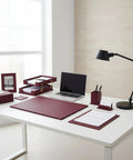 Premium Leather Desk Organizer Set Boss Level with desk pad, blotter, and accessories in burgundy on modern white desk.