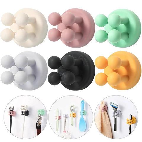 Four Pack Self Adhesive Silicone Toothbrush Holders Wall Mounted Mirror Hooks shown in six colors displayed with use examples.