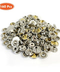 160 Piece Snap Button Kit With 15mm Marine Grade Snaps For Boat Covers Canvas Clothing And Leather Includes 40 Sockets 40 Caps 40 Male And 40 Female Snaps In A Clear Storage Box Brass Nickel Plated For DIYers. Assorted snap buttons in a pile showing brass and nickel details.