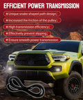 Premium 7PK2118 Serpentine Drive Belt For Toyota Tacoma And Tundra V6 beside a truck, showcasing its smooth design for power transmission.