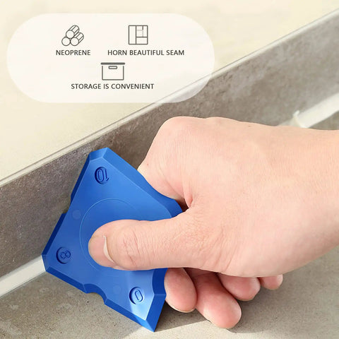 Using a blue tool from the 11 Piece Caulking Tool Kit With Sealant Finishing Tools to smooth caulk along a tile seam.
