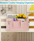 Bedside Caddy Organizer For Dorm Beds And Hospital Rails, Hanging Bed Storage Bag with Pockets in light pink with items inside