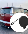 MINI Cooper Tow Hook Cover Cap 51121177907 Fits Front And Rear Bumpers For R50 R53 R52 R55 R56 R57 LCI displayed near vehicle rear