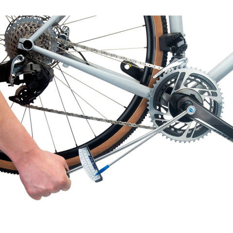 Using TW 2.2 Torque Wrench 0-60 Nm 3/8 Inch Drive for bike maintenance on bottom bracket, pro grade precision tightening.