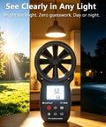 Digital Handheld Wind Speed Meter With Temperature And Wind Chill Readouts, High Precision Anemometer For HVAC, Camping And DIY Projects, Measures 0.67 To 67.1 Mph With About 2 Percent Accuracy, front view on table
