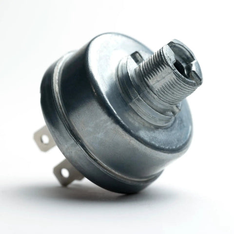 Close-up of metal Ignition Switch For Lawn Mower With Ultimate Protection System Dust Cover And Soft Grip Umbrella Key Upgrade.