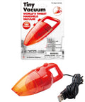 World's Tiniest USB Powered Vacuum With Tiny But Mighty Suction And Brush Attachment Included, handheld and packaged view, red color
