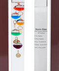 Close-up of Cool Indoor Weather Station With Glass Galileo Thermometer And Five Multicolor Balls From 64F To 80F in cherry wood frame