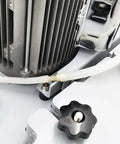 Close-up of Industrial Floor Scrubber Grinding Machine With 3.43 Gal Capacity, showing metal components and tubing