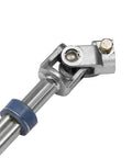 Close-up of steering column lower intermediate shaft with U-joint coupler, silver metal and blue bushing