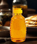 No Drip Honey Bottle Set For Easy Pouring 16 Oz Refillable Food Grade Containers With Leak Proof Flip Top Caps next to pancakes