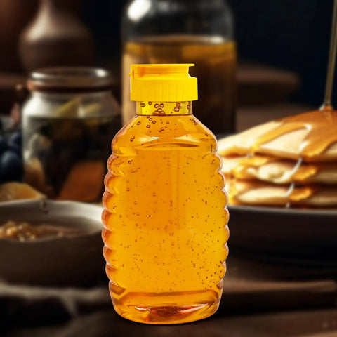 No Drip Honey Bottle Set For Easy Pouring 16 Oz Refillable Food Grade Containers With Leak Proof Flip Top Caps next to pancakes