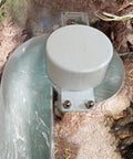 Portable 150W Micro Axial Flow Hydro Generator For Low Head Water Turbine 12V 24V DC Off Grid Hydropower System Built For Small Streams Easy Install And Reliable Power On The Go installed over rocks.