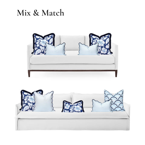 Coastal Patio Lumbar Pillow Cover 12x20 Inches Water Repellent Scalloped Edge For Indoor Outdoor Use Baby Blue Stripe Cushion Case With Invisible Zipper And Chill Vibe on white sofa with floral pillows.