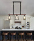 Three Light Vintage Industrial Pendant With Walnut Finish And Matte Black Frame Adjustable Hanging Light installed over kitchen island.