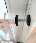 Close-up of M8 threaded tension bolt installed in door frame, part of 4 Pack Heavy Duty Threaded Spindle Rods Tension Bolts M8 Replacement Hardware Kit For Baby And Pet Safety Gates.
